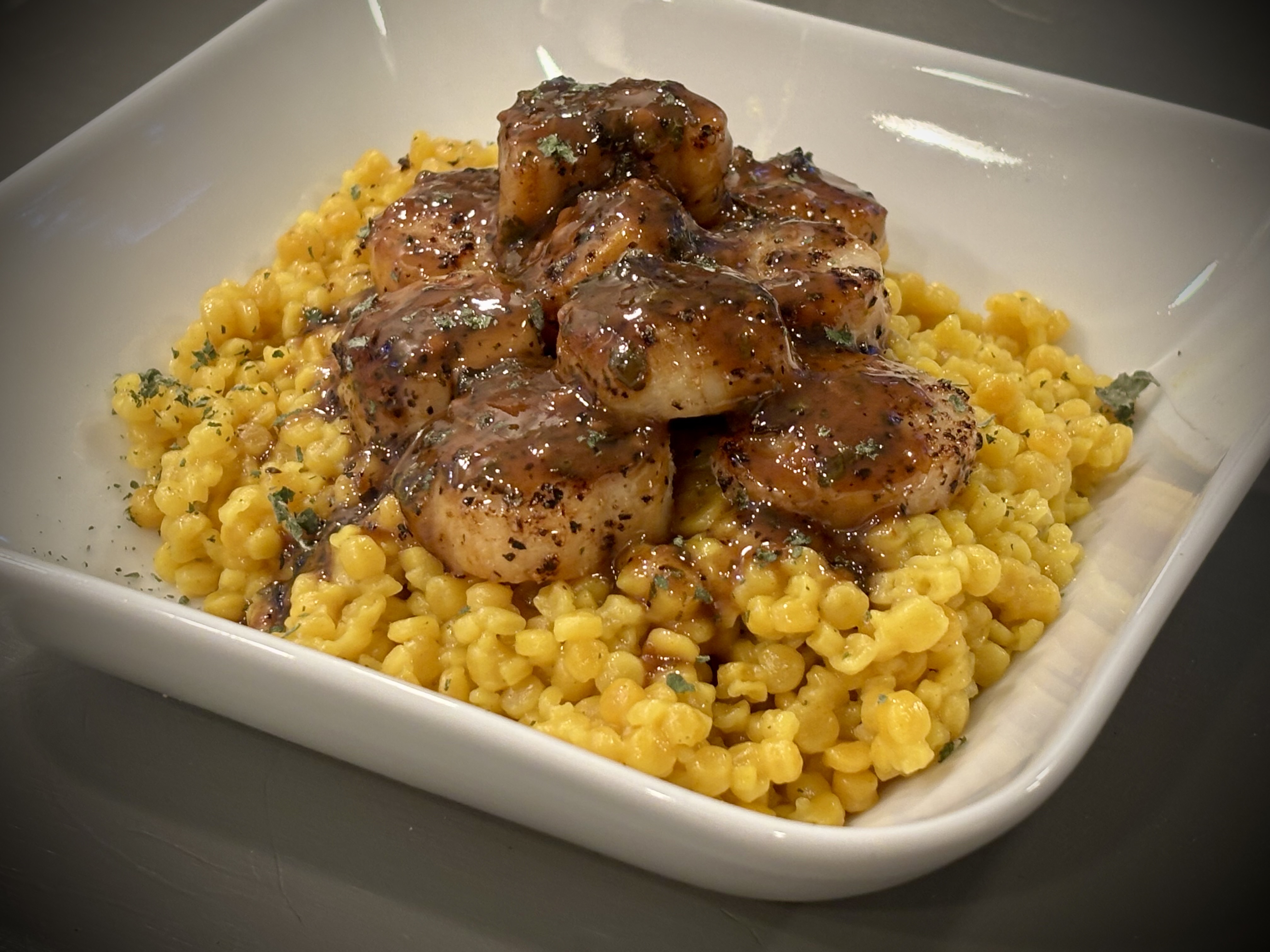 Lemon Balm Scallops with Tumeric Couscous